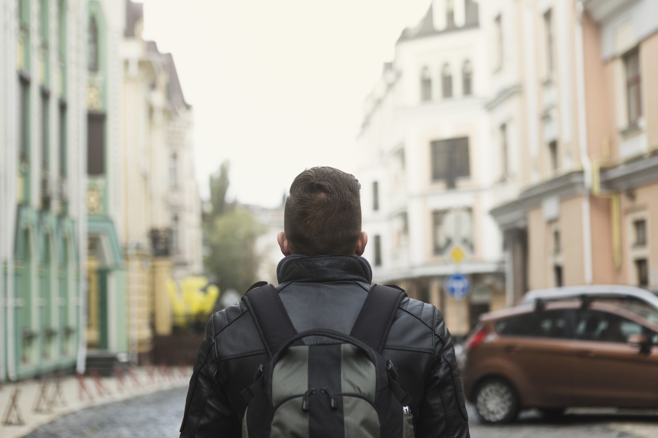 man-with-backpack-old-street_Easy-Resize.com